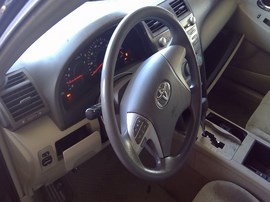 2009 TOYOTA CAMRY, BLACK, LE, 2.4L,  AUTO.  Z25156